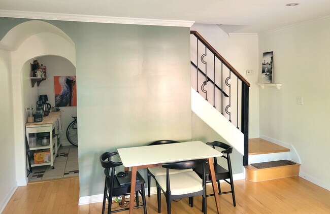 Living room connecting to Kitchen and stairs upstairs - 2700 16th St S