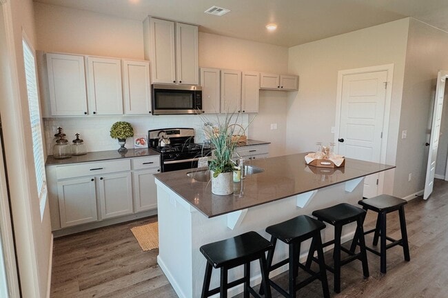 Building Photo - SPECIAL OFFER!! Modern. Efficient. Move-In...