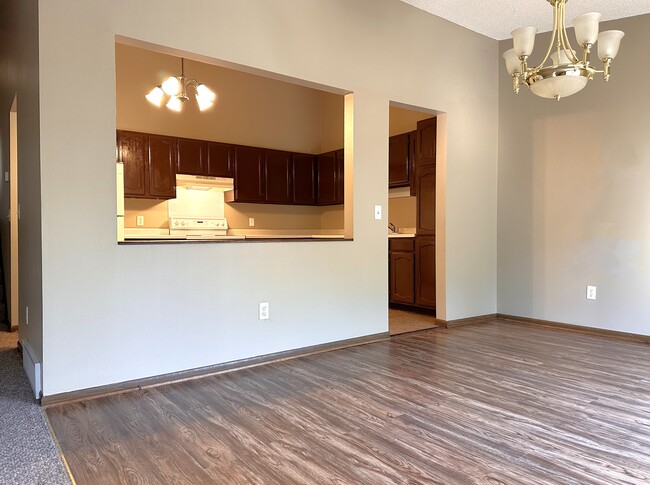 Dining room. Lots of light. Deck is off the dining room. - 8016 Zane Ave N