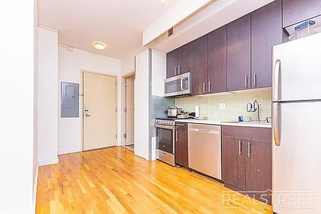 Building Photo - Massive Outdoor Patio | Spacious 3BR/2BA Apartment in Bushwick–East Williamsburg