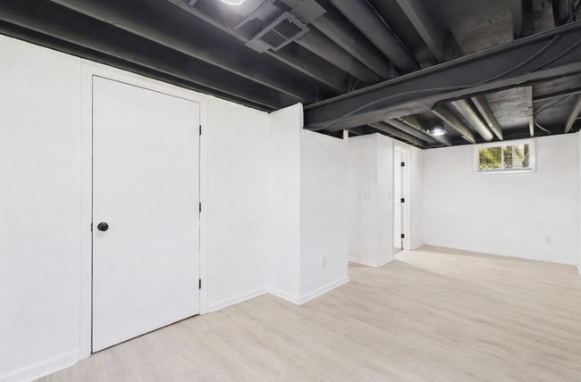 Building Photo - Stylishly Updated 4BR/3BA with Expansive Back Deck