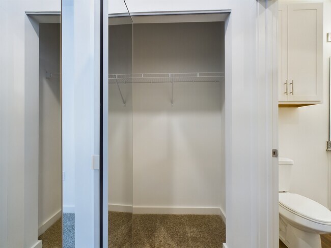Closet Side 2 - Aurora St. Leon Apartments