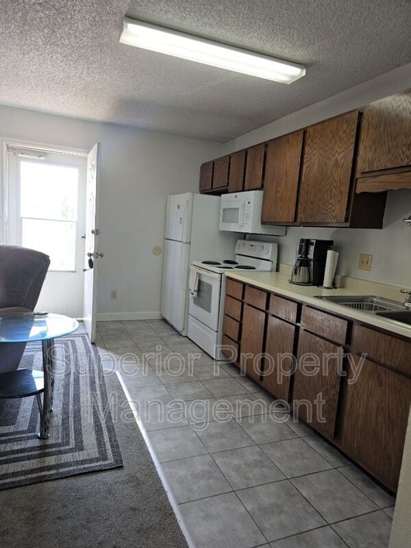 Building Photo - 4950 King Arthur Way