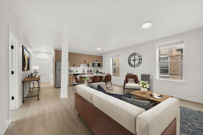 Foto del edificio - 6975 N Bell Ave