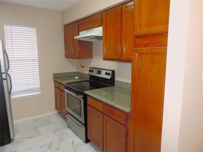 Foto del edificio - 10555 Turtlewood Ct