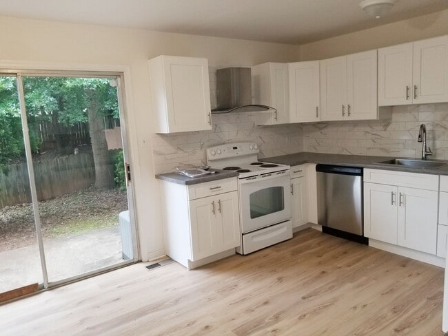 Photo - A spacious 3-Bedroom 1.5-Bathroom 3 Story ... Townhome