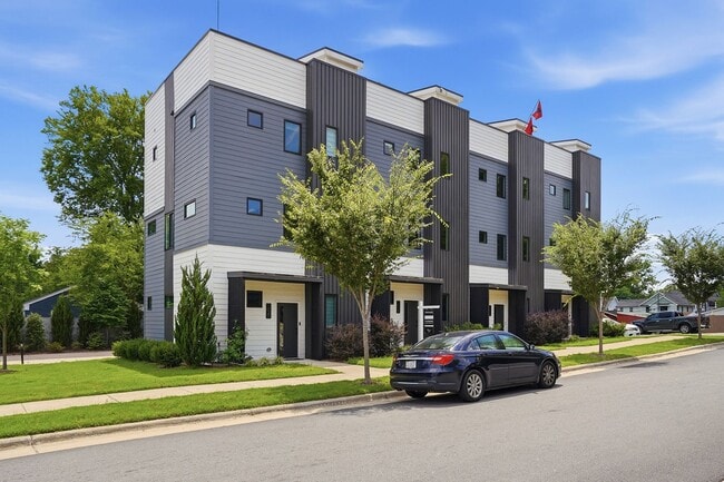 Building Photo - Live Elevated in Downtown Raleigh – Stunning Townhome with Rooftop Oasis!