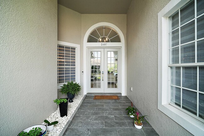 Foto del edificio - Stunning 5-Bedroom Pool Home in Gated Comm...