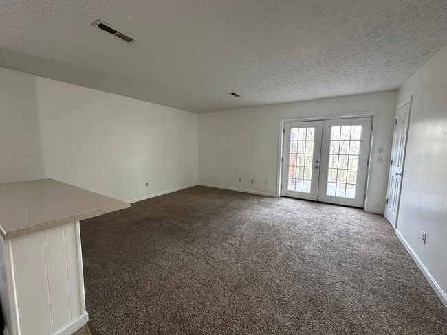 Building Photo - Basement apartment. Water, trash, lawn car...