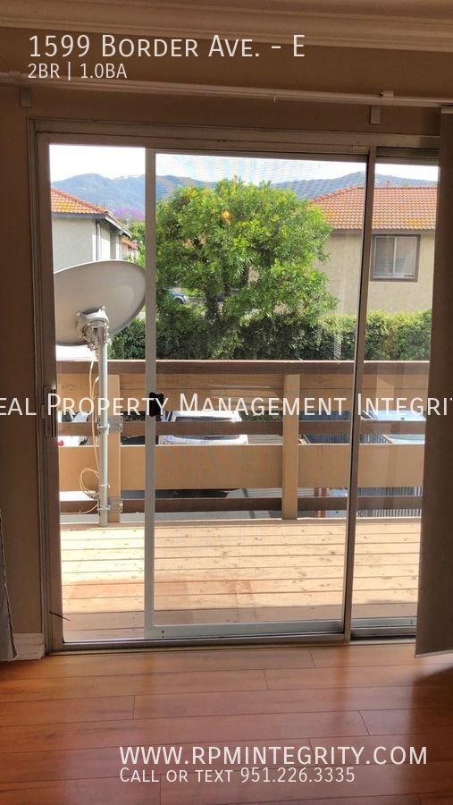 Building Photo - Windwood Condominium located in the beauti...