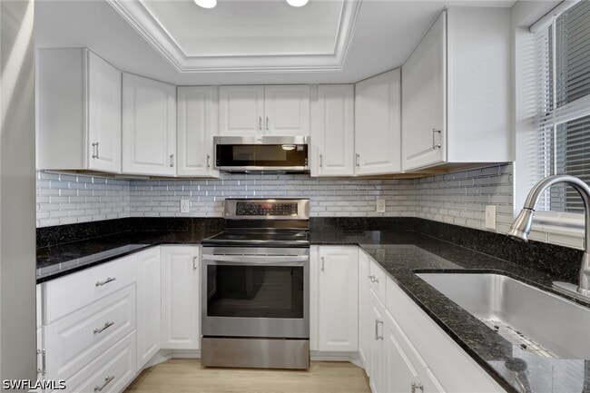 Building Photo - 4912 Tamiami Trl E