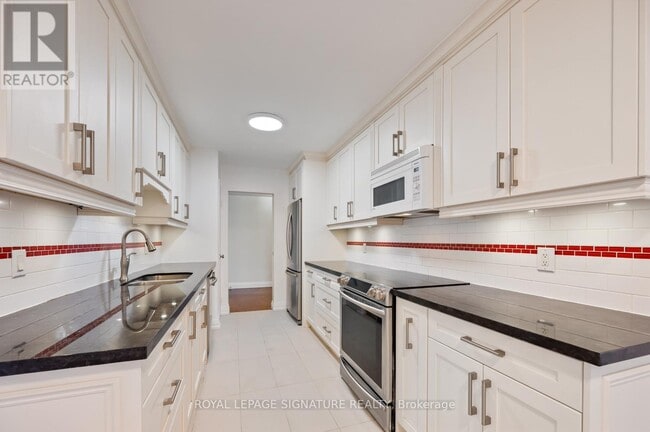 Photo du bâtiment - 260-1260 Heath St W