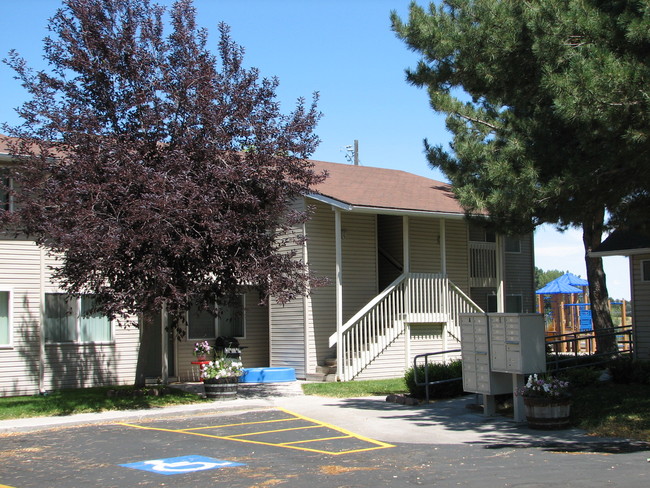 Building Photo - Evergreen Village Apartments