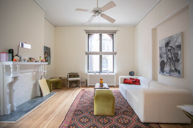 Living Room with arched window toward Locust St - 2013 Locust St