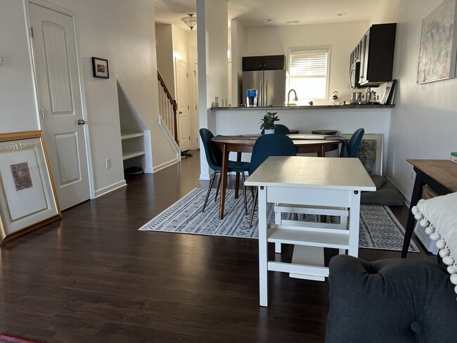 View from living room into dining room and kitchen - 4515 Exuma Ln