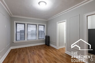 Building Photo - 5451 S Cornell Ave