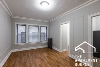 Building Photo - 5451 S Cornell Ave
