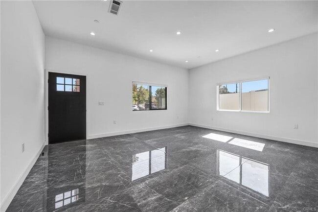 Building Photo - 6825 Ranchito Ave