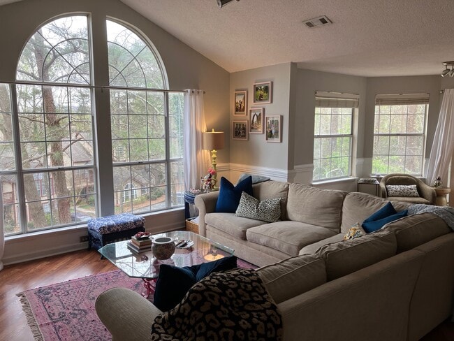Livingroom with large outside window - 709 Cypress Pointe St