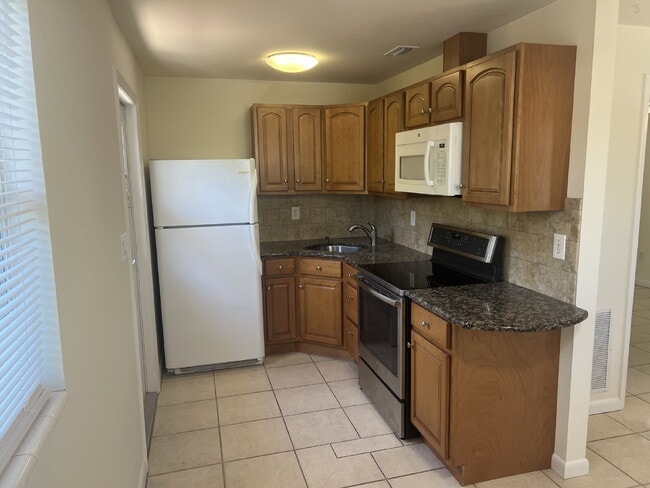 Building Photo - Utilities Included - Clean 1BR Naples Park Apartment Near Vanderbilt Beach - $1,450