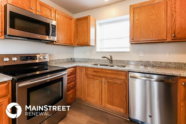 Foto del edificio - 13900 E 50th St
