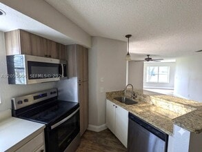 Building Photo - 3430 Pinewalk Dr N