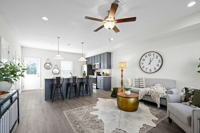 Spacious Living Room with Wood Style Flooring - Victory Place