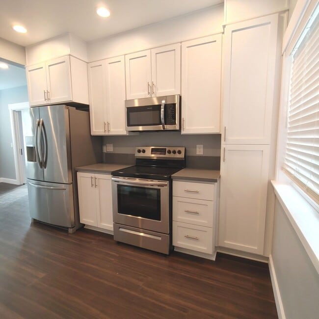 Building Photo - Renovated SE Portland Gem: Original 1913 Character with Chef’s Kitchen & Park Access