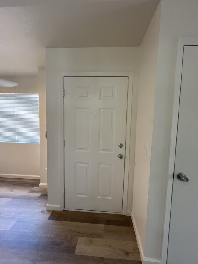 Building Photo - "Charming 2-Bedroom Multiplex with Cozy Fi...