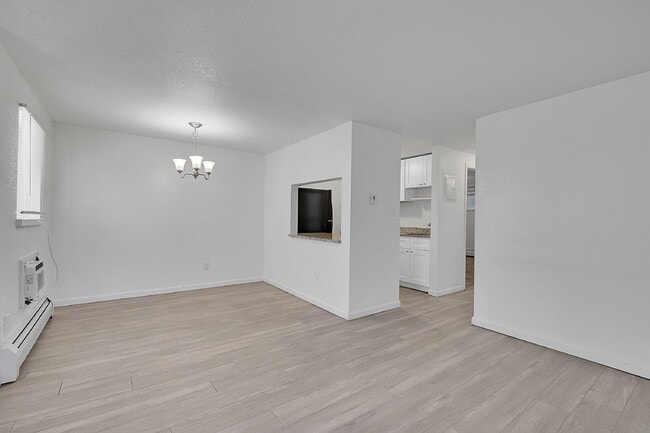 Building Photo - $1,470.95  - 2 Bedrooms, 1 Bathroom, Condo in Denver with Cozy Carpet!