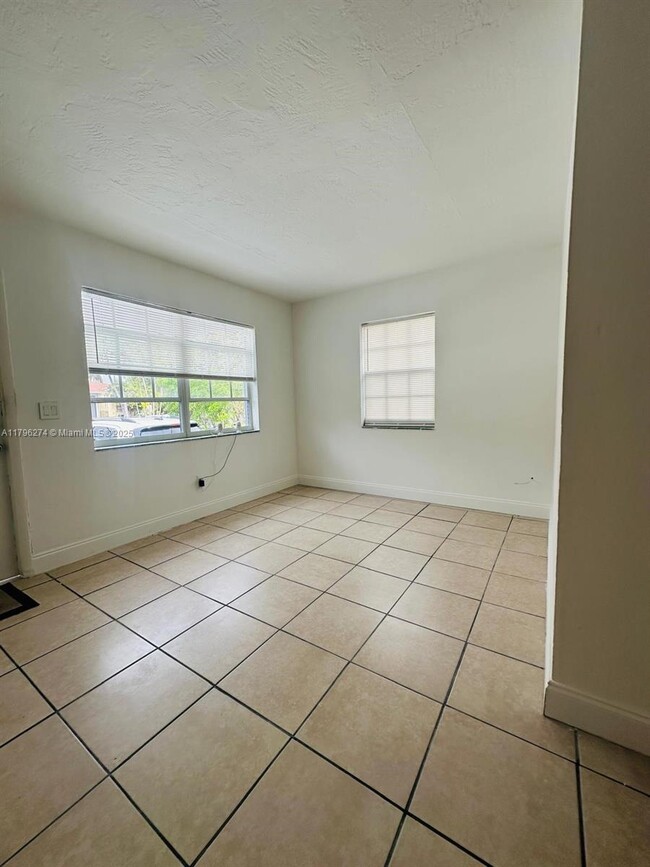 Building Photo - 115 NW 56th Ave.