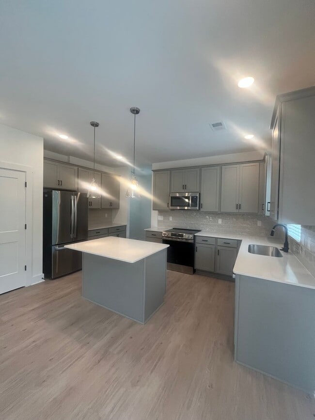 Building Photo - New Construction Home with 4 Bedrooms, 2.5 Baths, 2 Car Garage, Fenced Yard