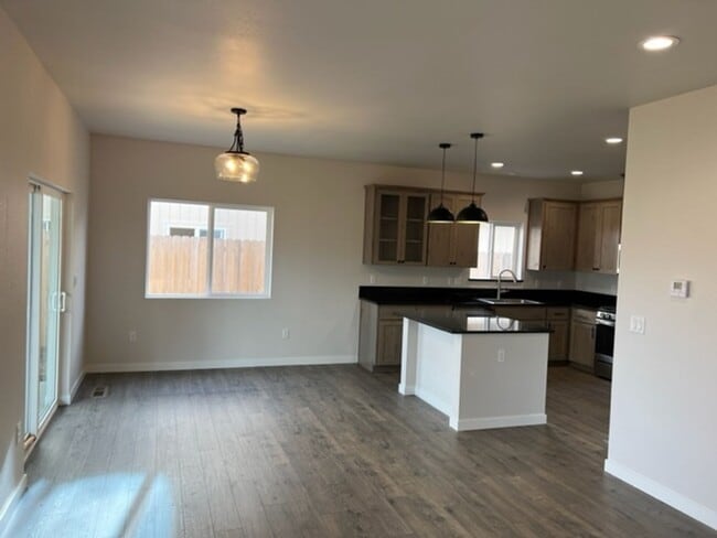 Building Photo - ALMOST NEW CONSTRUCTION/ 4 BEDROOM IN NEWER UPCOMING NEIGHBORHOOD