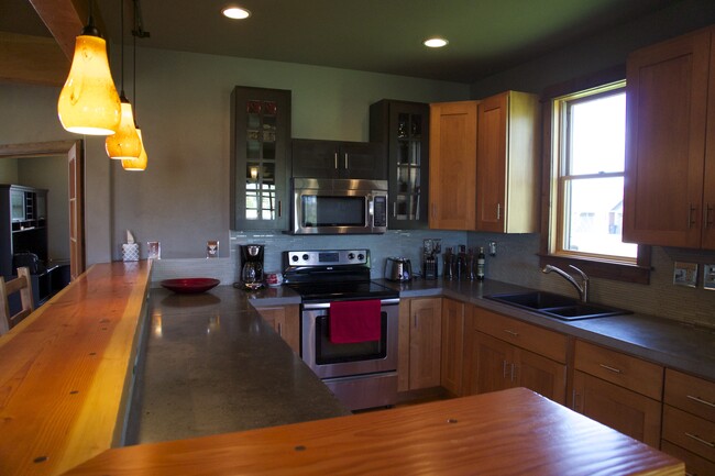 Kitchen with polished concrete countertops - 2414 Arabian Ave