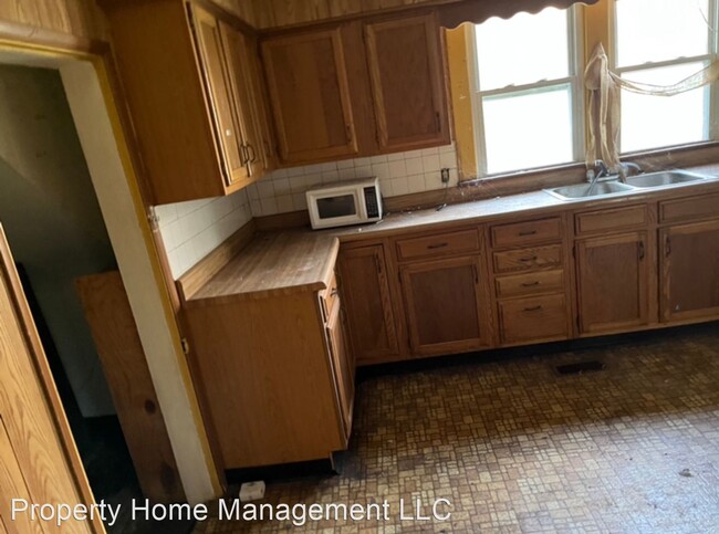 Foto del edificio - 4 br, 1 bath House - 303 S. Franklin St.