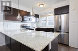 Photo du bâtiment - 701 Homer Watson Blvd