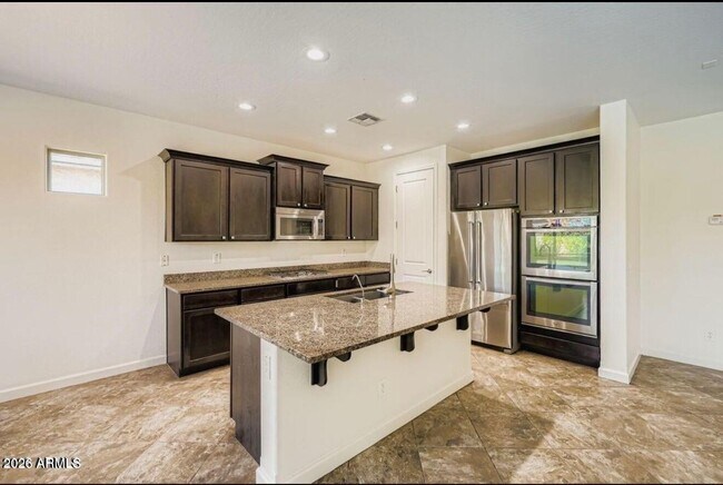 Foto del edificio - 10824 E Quintana Ave