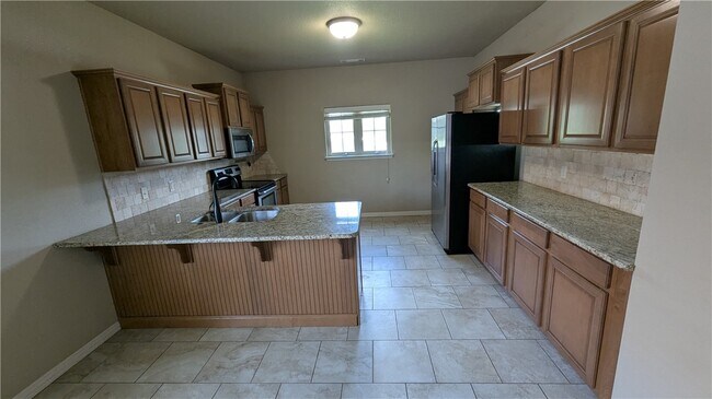 Foto del edificio - 4001 S W Capstone Ave