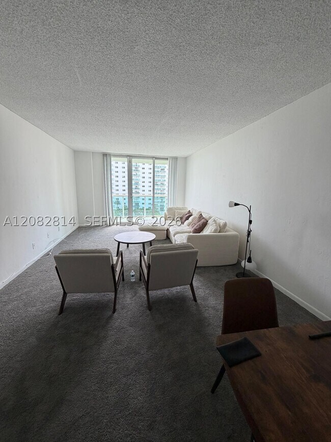 Building Photo - 19380 Collins Ave