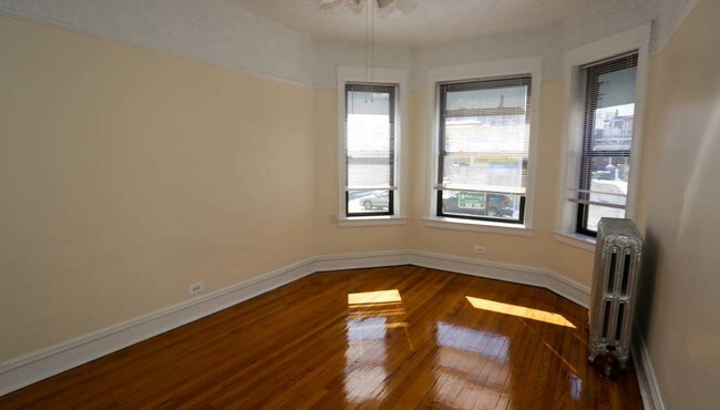 Building Photo - 1002-16 W. Irving Park Rd. / 4006-08 N. Sh...