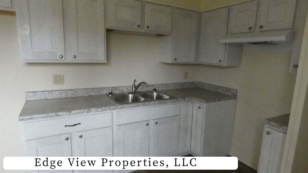 Kitchen - photos of opposite unit. However, this unit has similar finishes & mirror image floor plan - 500 S Darst St