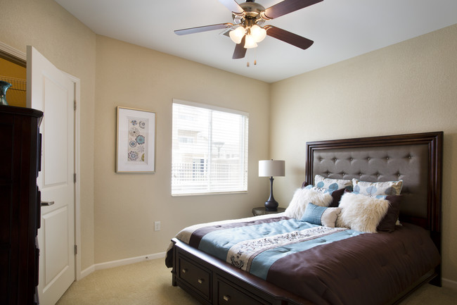 Unit Bedroom - SunSTONE Apartment Homes at Fox Ridge