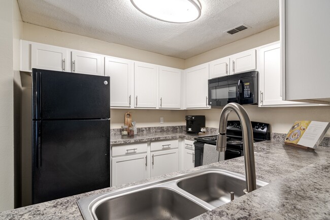 Beautiful Kitchen - The 1800 at Barrett Lakes Apartments