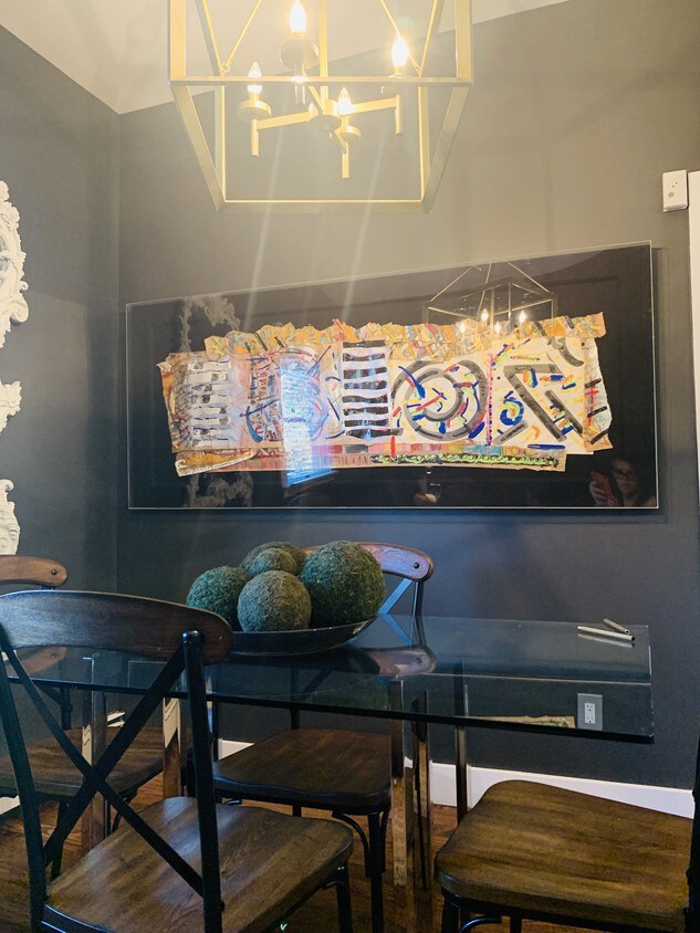 Original Art hangs In the dining area - 117 Sound Rd