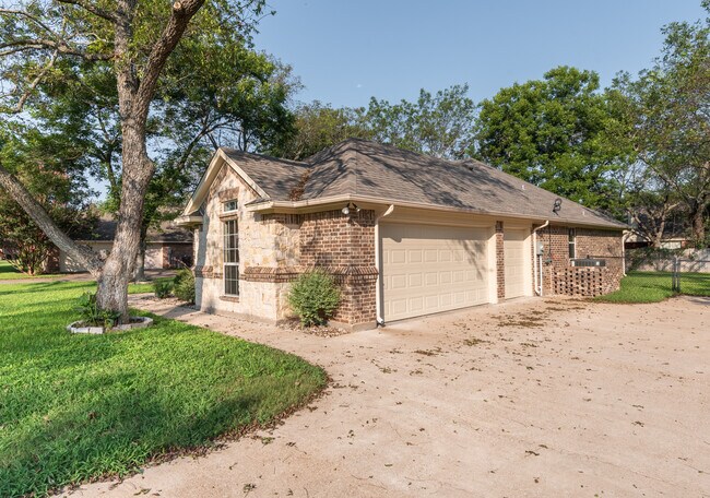 Side of house - 8918 N Longwood Dr