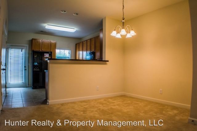 Building Photo - 2 br, 2.5 bath House - 4513 Brassfield Dr.
