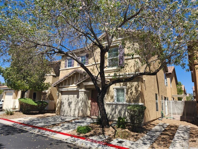 Building Photo - Sleek 2 story home with tile in most living areas and upgraded kitchen.