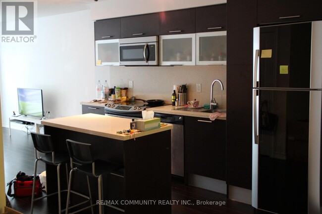 Photo du bâtiment - 386-386 Yonge St