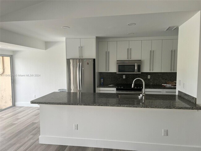 Foto del edificio - 12319 SW 110th South Canal St Rd