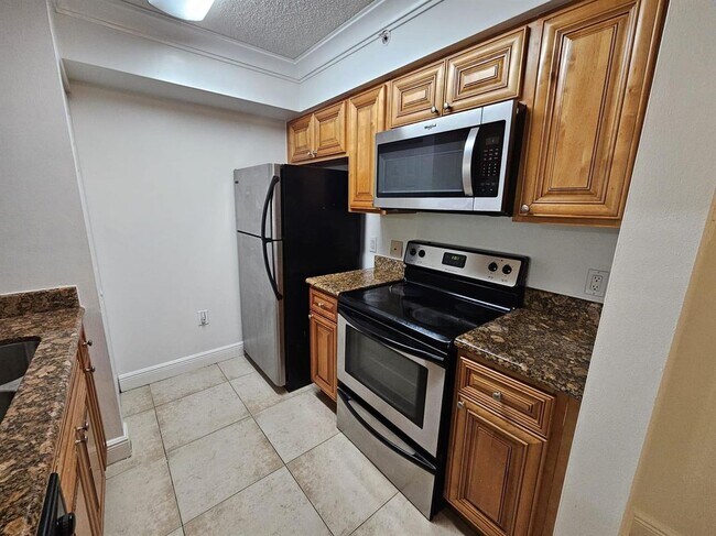 Building Photo - 12136 St.Andrews Place, #104